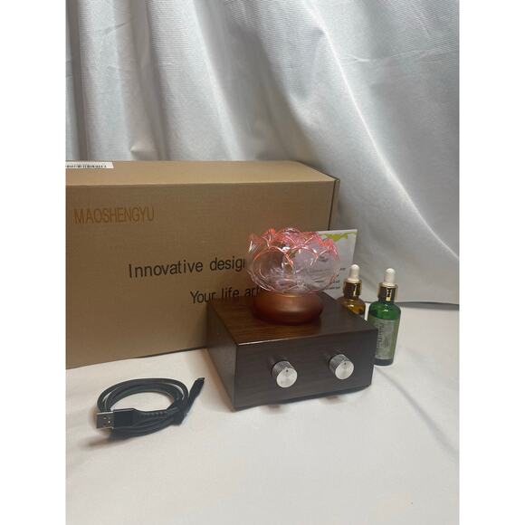 Aromatherapy diffuser with Bluetooth capabilities 2 scents included - Picture 2 of 4